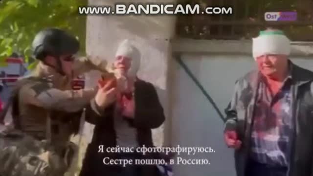 Ukrainian actors dressed as wounded take selfie in Kiev