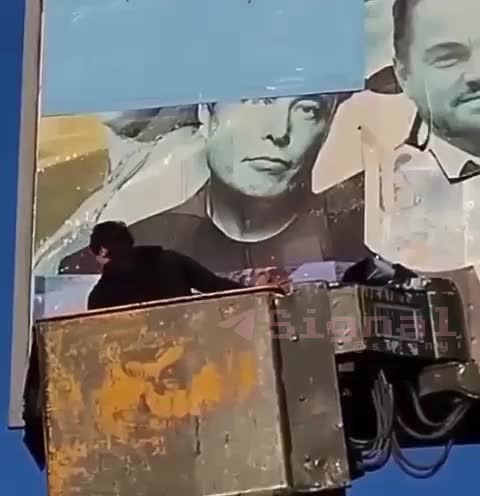 Elon said let's negotiate peace...and then Ukraine ripped him off their billboards.