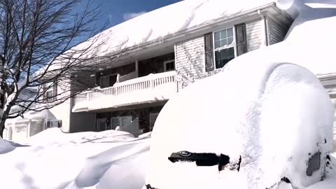 New York state residents dig out after heavy snowstorm
