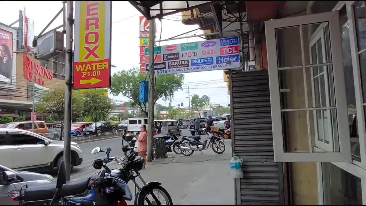 Walking the streets of downtown Iloilo City Philippines