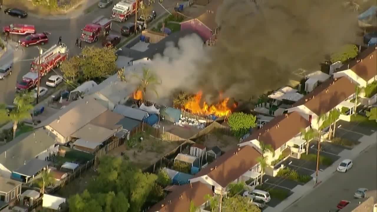 Watch: Crews battle fire at a home in National City