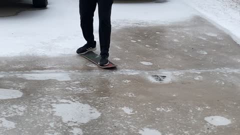 Texan Attempts Skateboarding on Ice