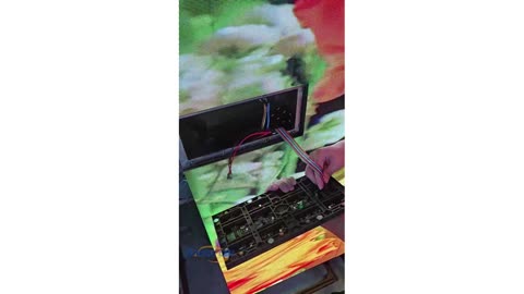 Technicians are installing the led module of the poster screen