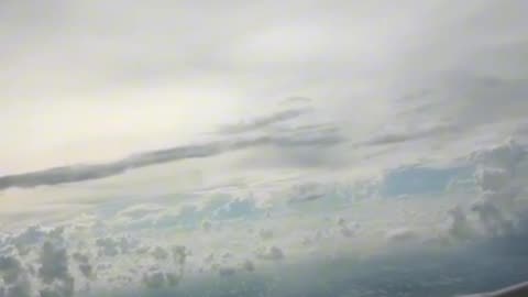 Some mysterious thing caught FLYING IN AIR DURING FLIGHT