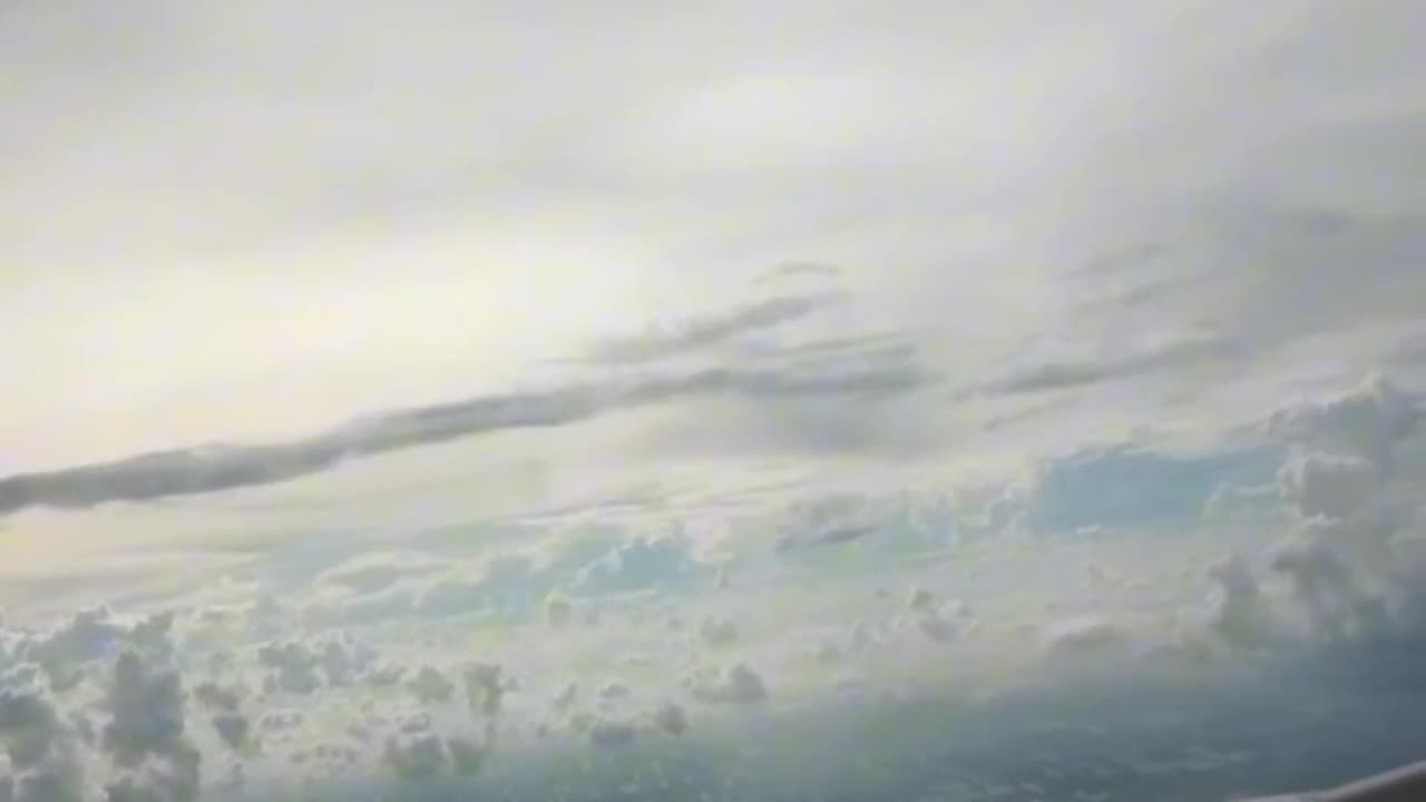 Some mysterious thing caught FLYING IN AIR DURING FLIGHT