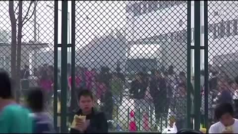 Foxconn apologizes in bid to calm protests