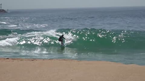Surfing and Skimboarding WEDGE on massive HIGH TIDE