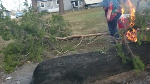 BURNING BRUSH AFTER A BIG WIND STORM