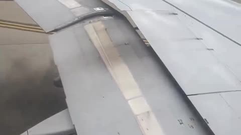 Scary moment United Airlines airliner catches fire just before departure from Chicago's O'Hare