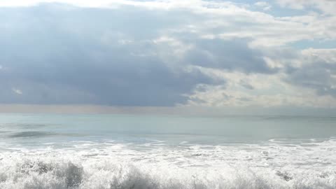 Relaxing along the beach listening to soothing ocean waves