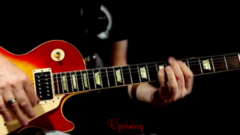 Uprising (Total) Guitar Lesson