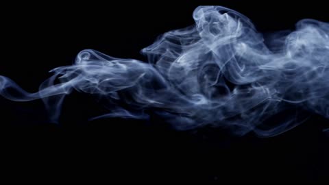 Great Plasma Effect Created By Swirls Of White Smoke With Black Background In 4K