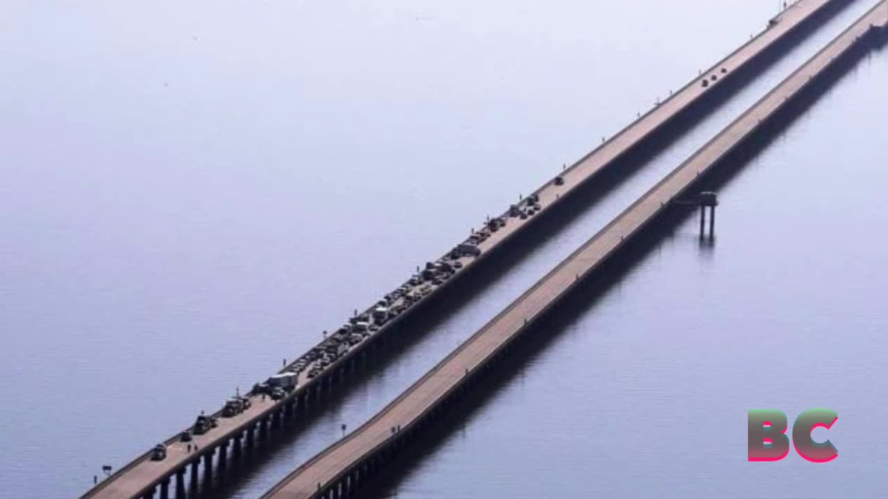 Car crashes in foggy weather injure 33 people and force bridge near New Orleans to close