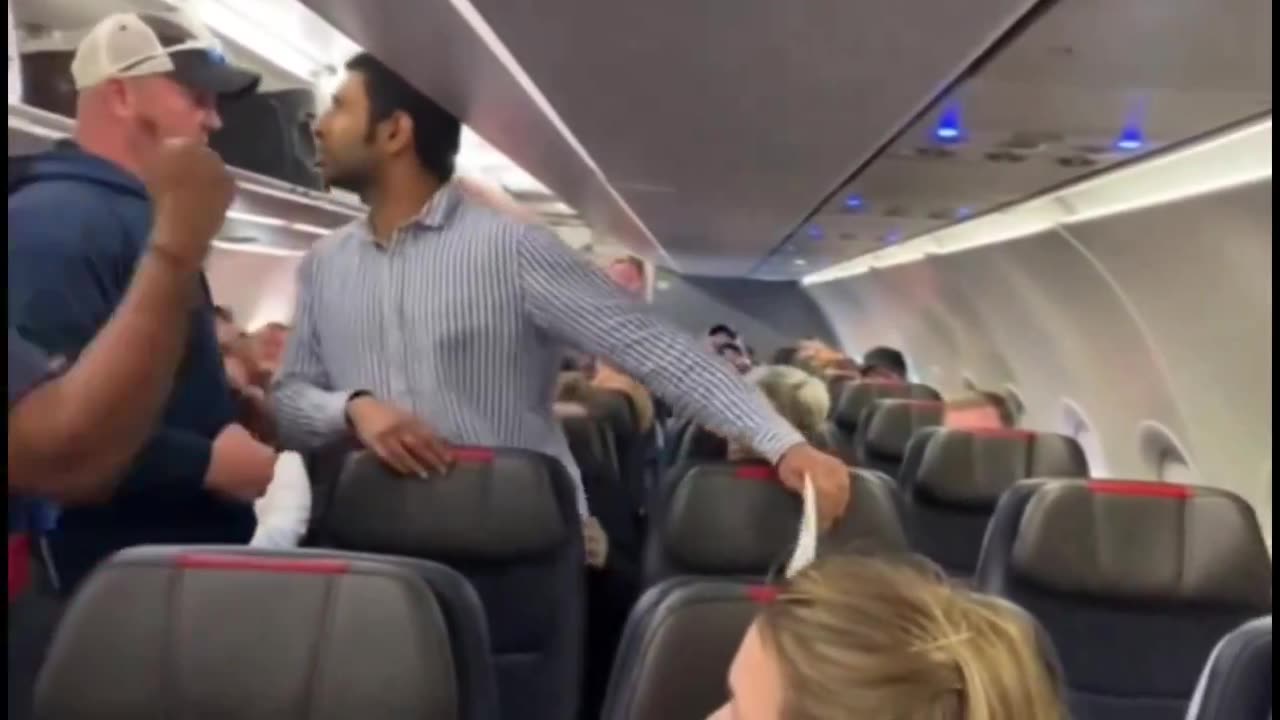 A belligerent American Airlines passenger was put in a headlock and dragged