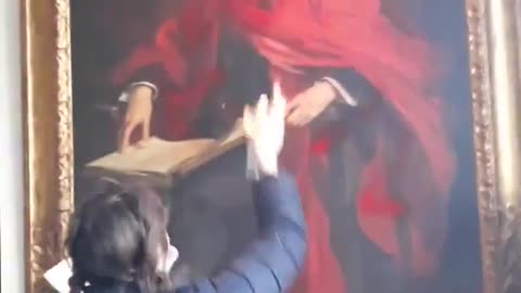 🚨Masked Palestinian female activist completly destroys historic British painting.
