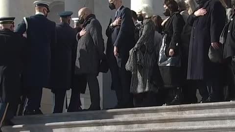 The casket of former Majority Leader Harry is carried into the where he will lie in state.