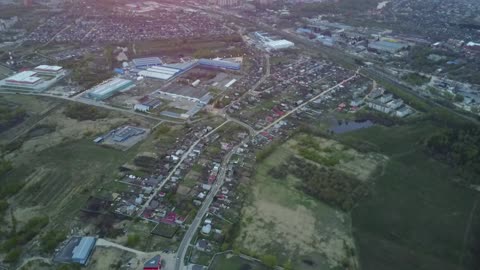 Sunset over the city from a bird's-eye view