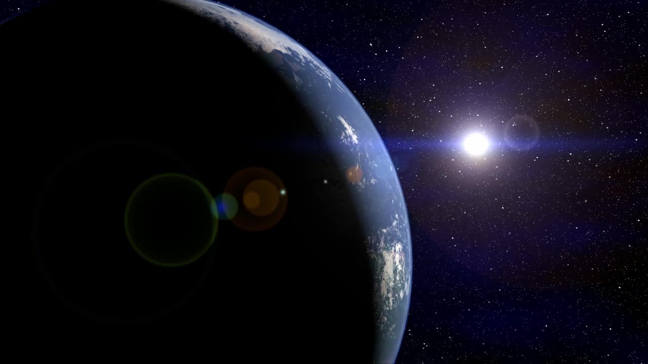 The planet earth rotates facing the sun in starry space (loop)