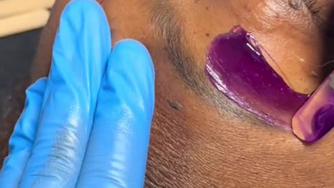 @dallasatstudio1 performs underarm and eyebrow wax using Sexy Smooth Purple Seduction Hard Wax