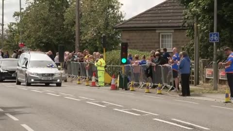 Mourners applaud as Leeds Rhino star Rob Burrow's cortege passes by