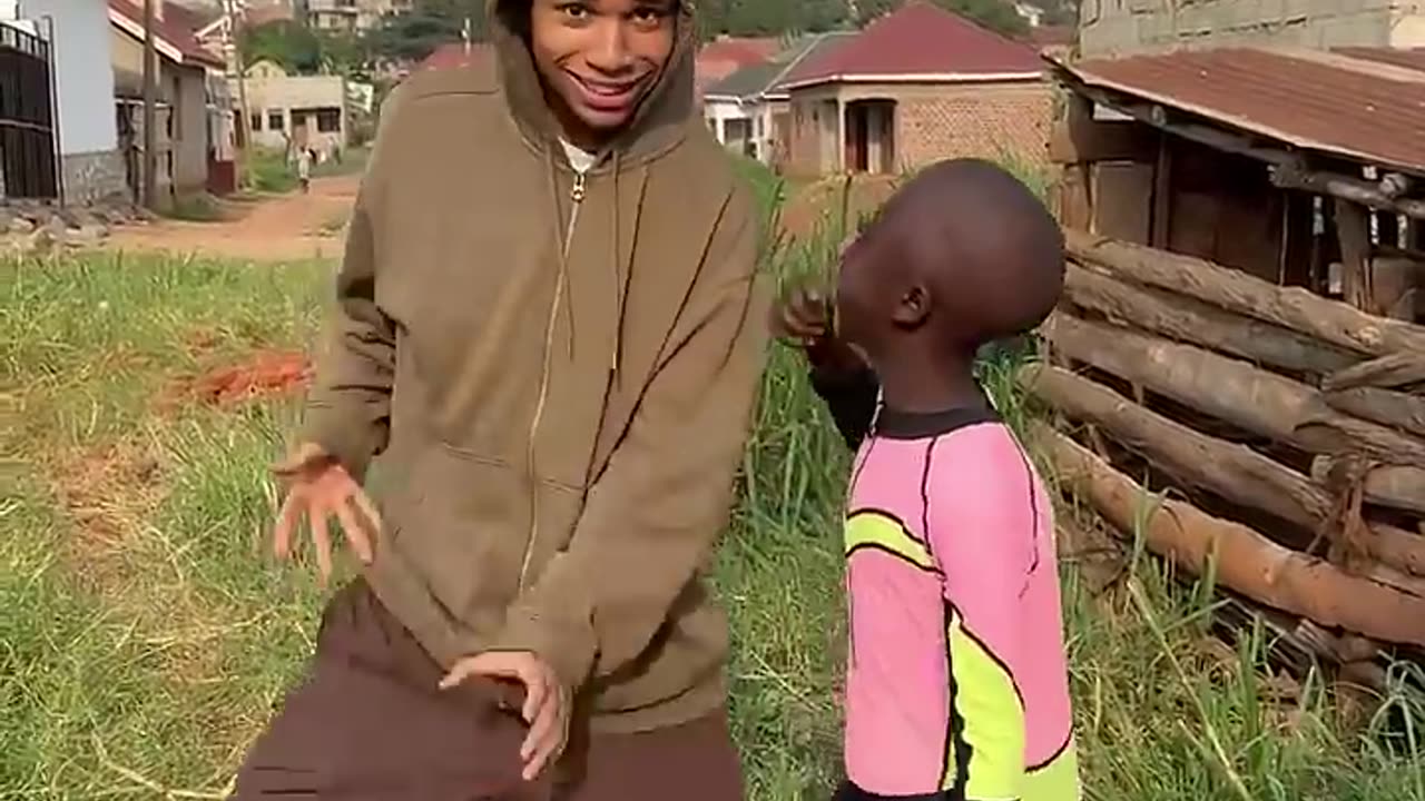 A Black little boy Funny Dance