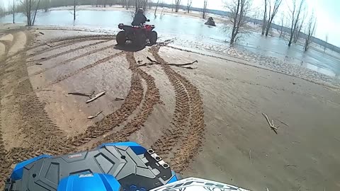 River riding Polaris Sportsman 1000xp