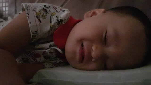 Baby smiling white sleeping