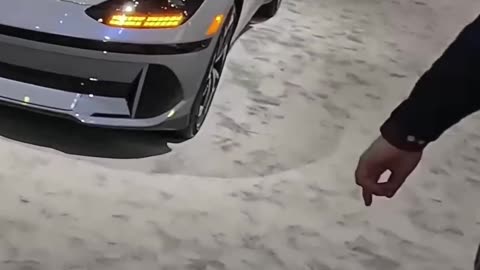The New Model Electric Car: Sliding Console & Unique Seats