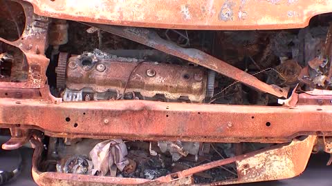 Car wreck from Bucha goes on display on Berlin