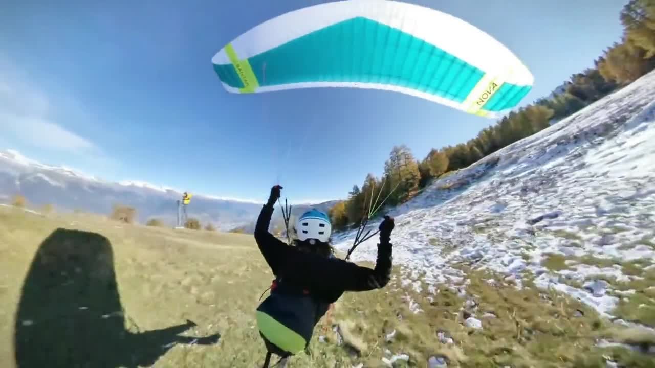 Flying close to the ground in the snowy mountains