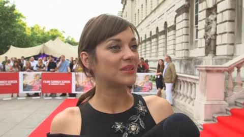 Marion Cotillard recalls '100-take' scene at Two Days, One Night premiere