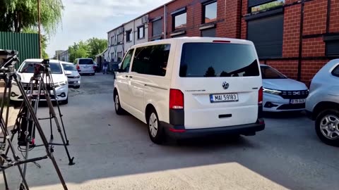 Romanian police escort Tate from home following raid