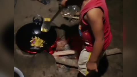 Baby cooking in kitchen ।