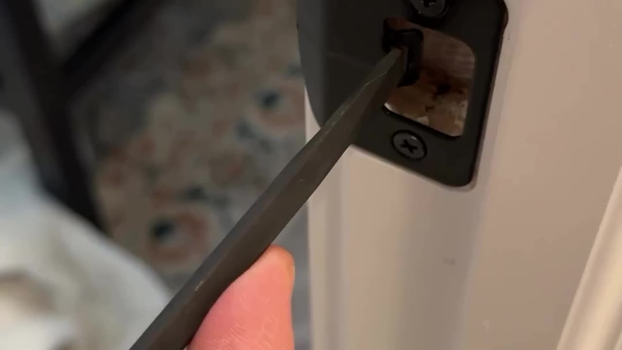 Quick tip to fix a jiggly door.If you have this type door strike plate you can fix it with ease