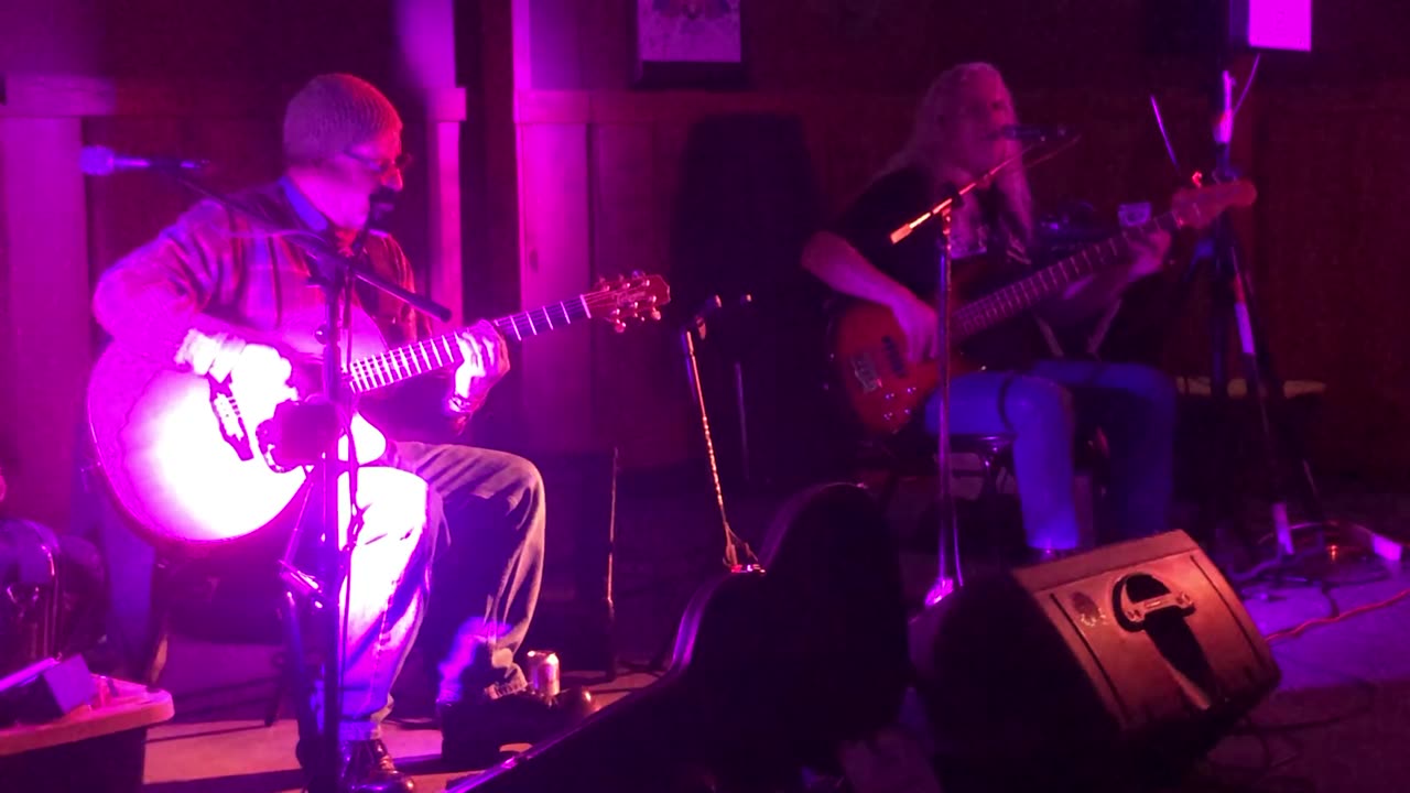 Creedence Clearwater Revival's LOOKIN' OUT MY BACK DOOR covered by The Strawberry Jam Duo!