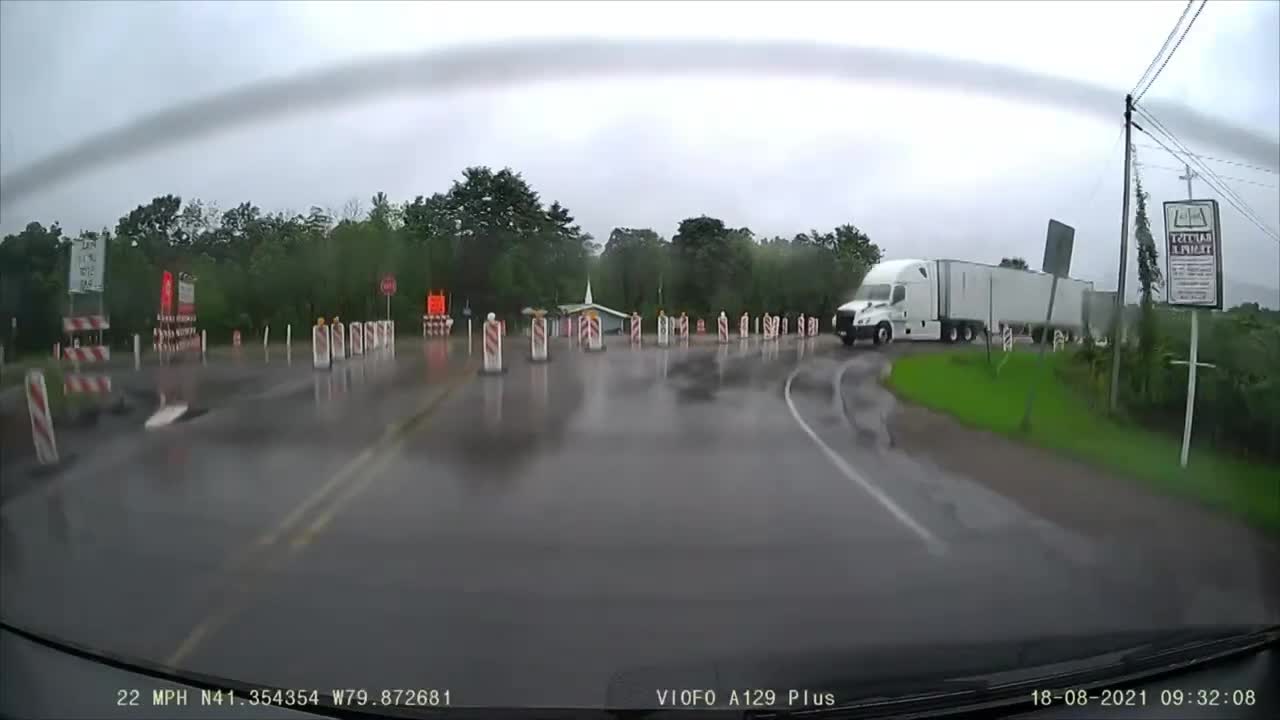 Truck Plows through Cones Right into a Construction Zone