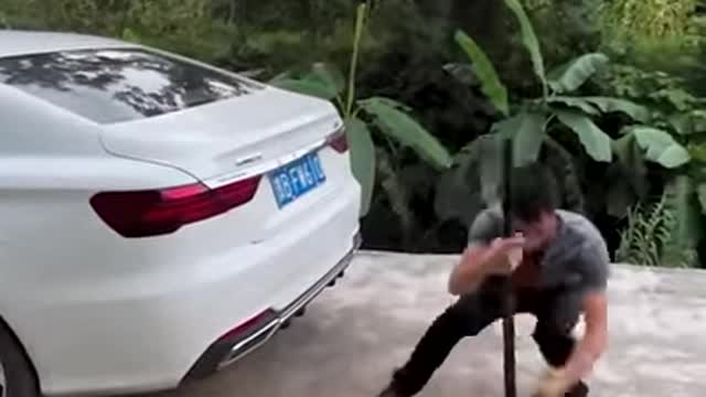 What should you do if the rear wheels of the car fall into a pit