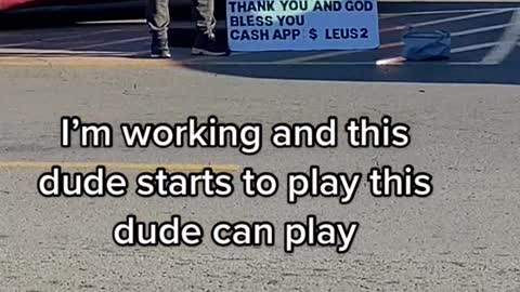 I'm working and this dude starts to play this dude can play