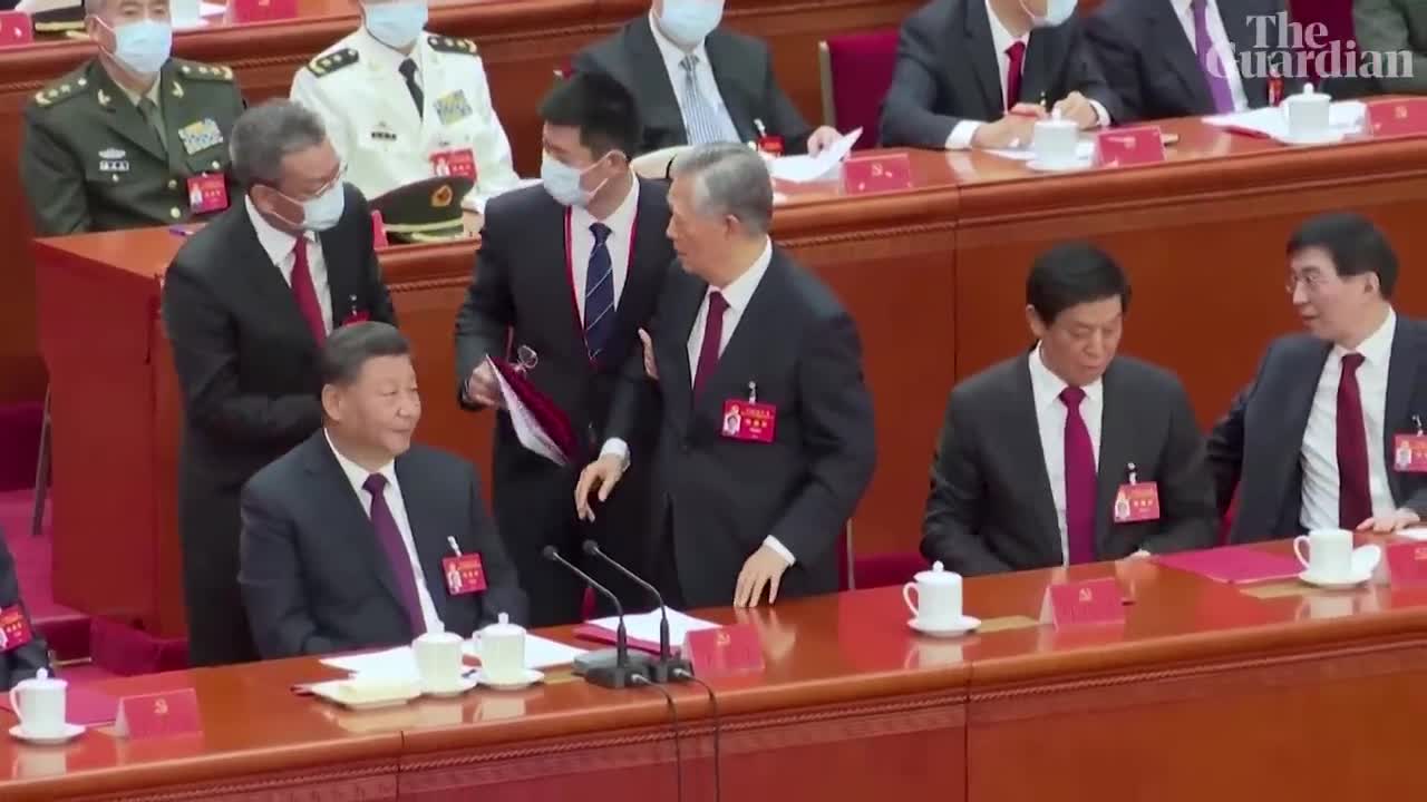Former Chinese president Hu Jintao unexpectedly led out of party congress (1)