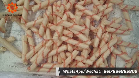 Colorful puffed core filling snack food making machine testing before shipment to Egypt