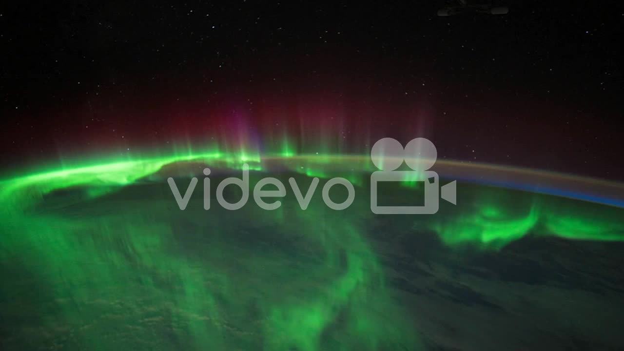 International Space Station Flies Over The Earth with Aurora Borealis Visible 1