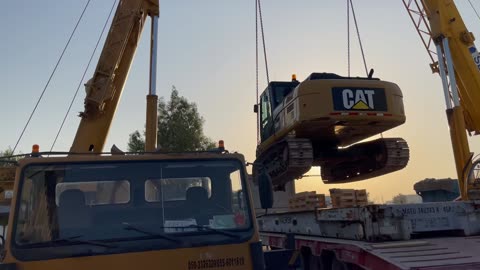 K.I transport (LOADNG Jcb Crane on trailer)