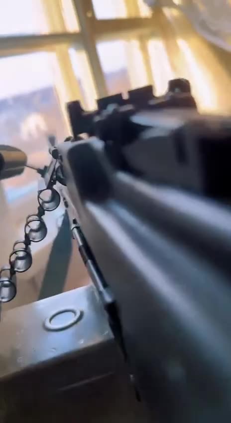 Firing Heavy Machine Gun Out of a Window in Bakhmut
