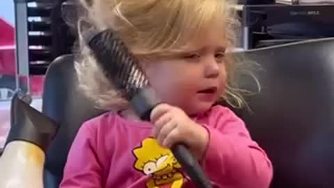 Haha sweet girl! Look at here hair