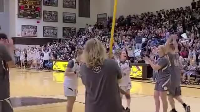 Blind girl tries a shot by listening to the voice box