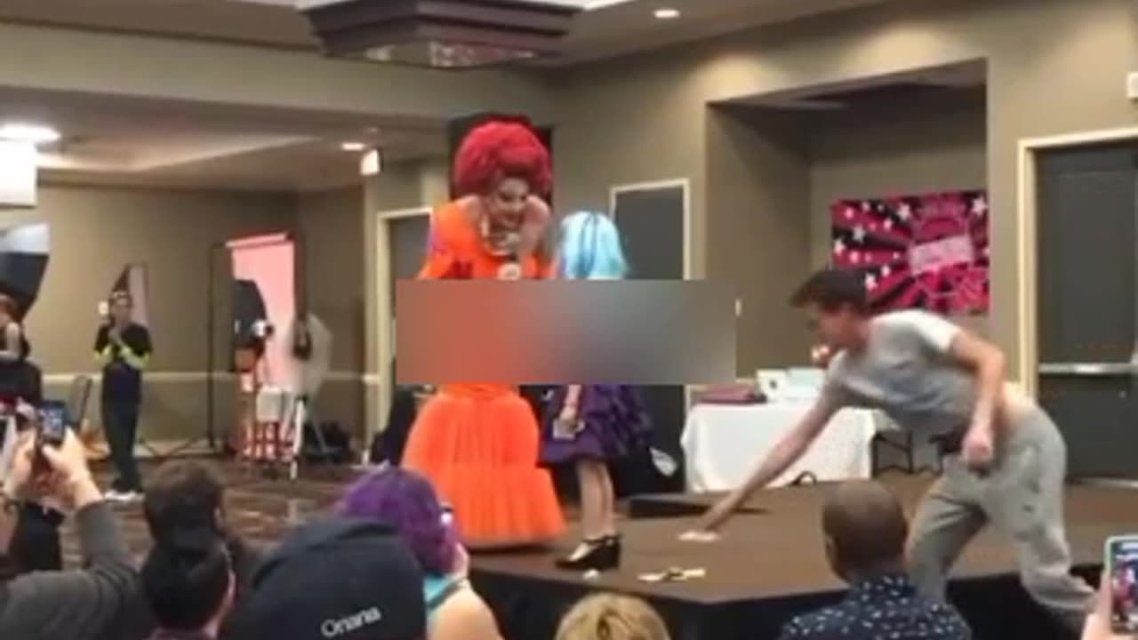 Drag queen teaching a 7-year-old how to be a drag queen and perform for cash tips.