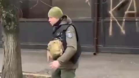 Kherson, Ukriane: Ukraine soldiers vandalizes restaurant, throws rock through window