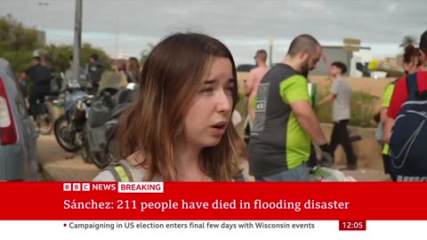 Thousands of volunteers help with clean up in flood-hit Valencia