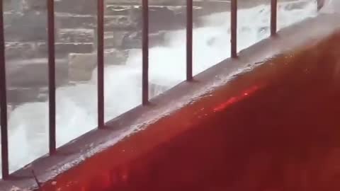 Water Overflows Down Stairs in Edinburgh Alley After Heavy Rainfall