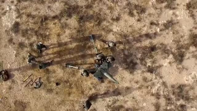 Russian Ka-52 firing on Ukrainian positions.